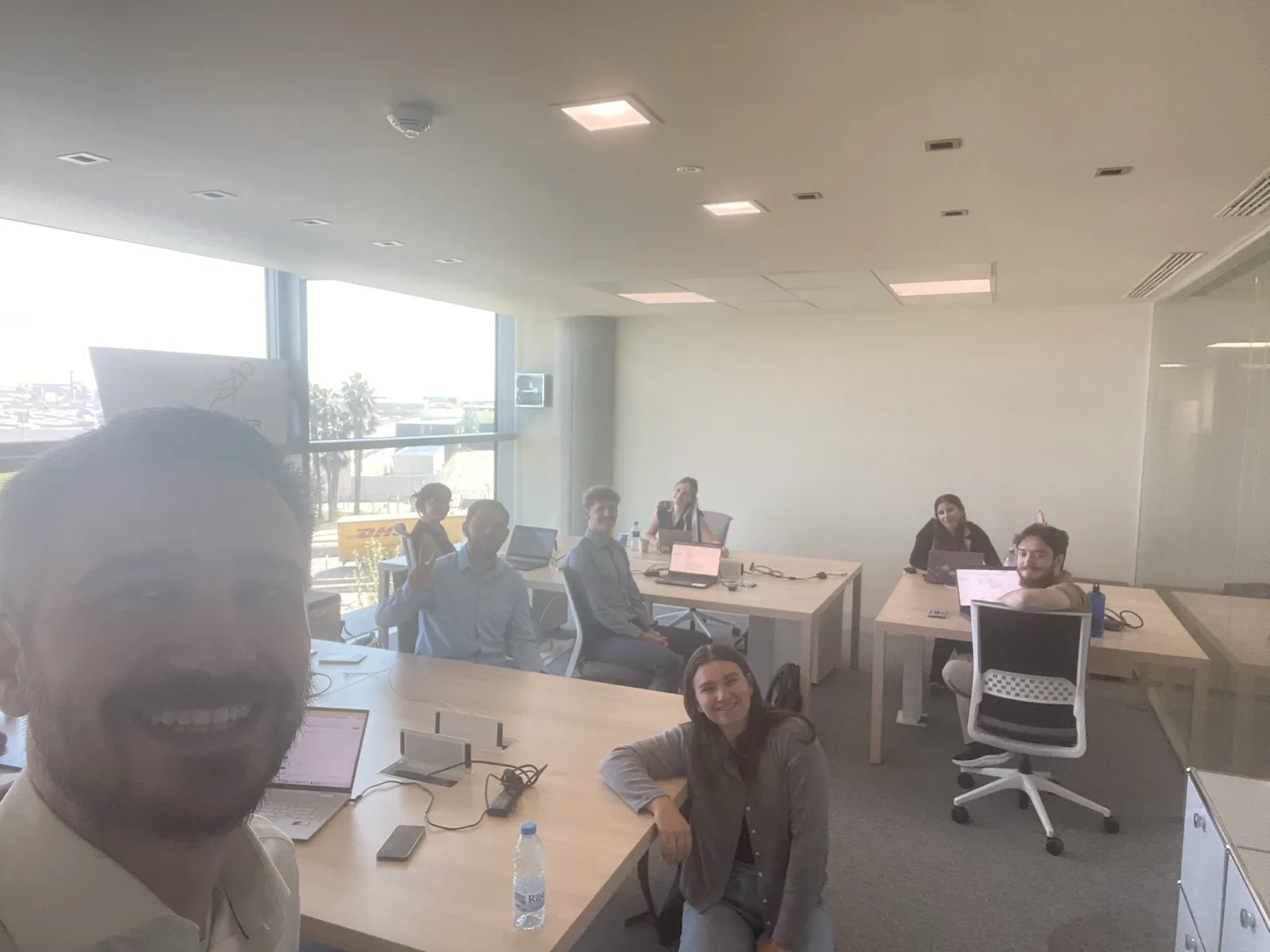 Selfie with the Grasshopper interns in the office, May 2025.